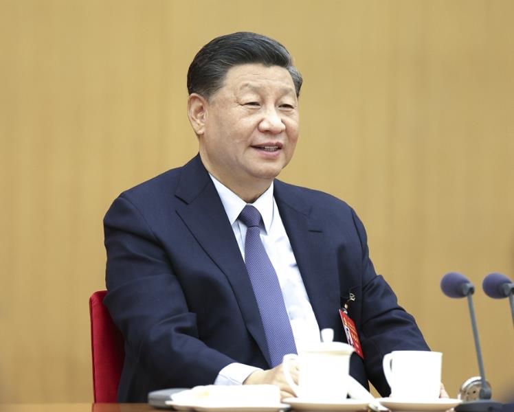 10月17日，習近平同志參加黨的二十大廣西代表團討論。新華社記者 鞠鵬 攝